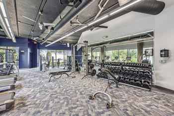 24-Hour fitness center with yoga & spin studios